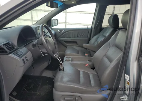 2010 Honda Odyssey Exl z USA, uszkodzony, nr VIN 5FNRL3H60AB078211